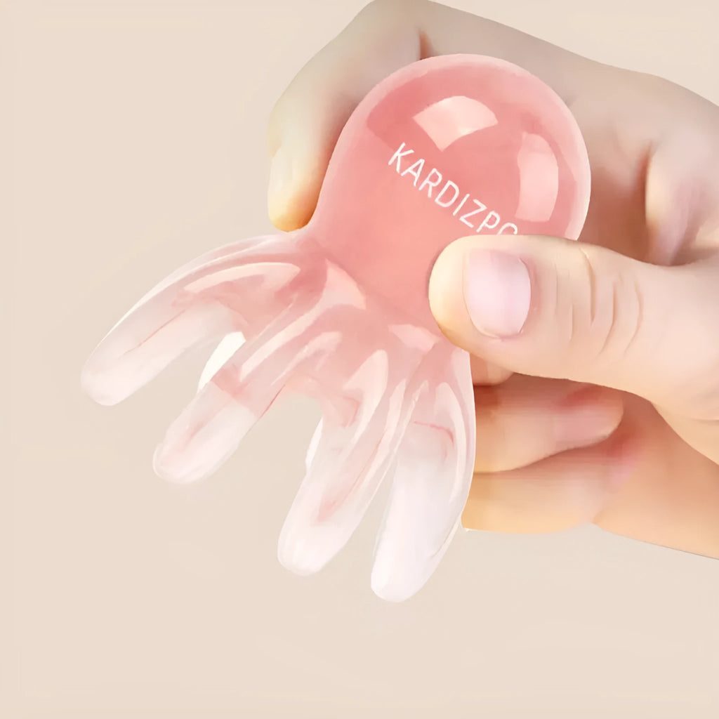 Pink natural resin octopus massage comb for periocular meridian stimulation with storage bag