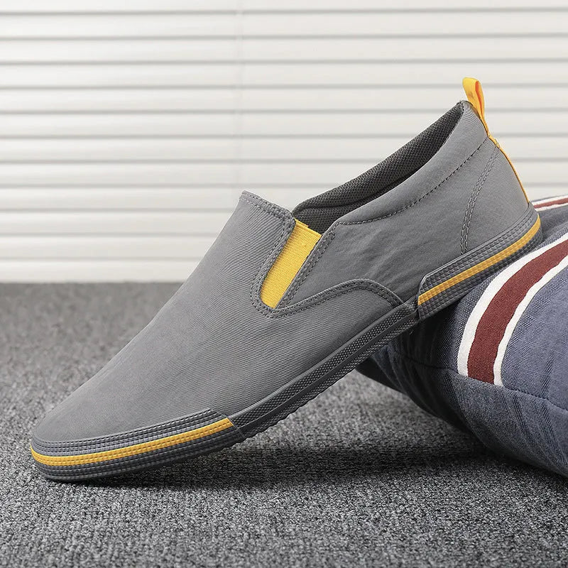 Men's low top canvas casual shoes with rubber vulcanised sole in grey, black orange, or khaki