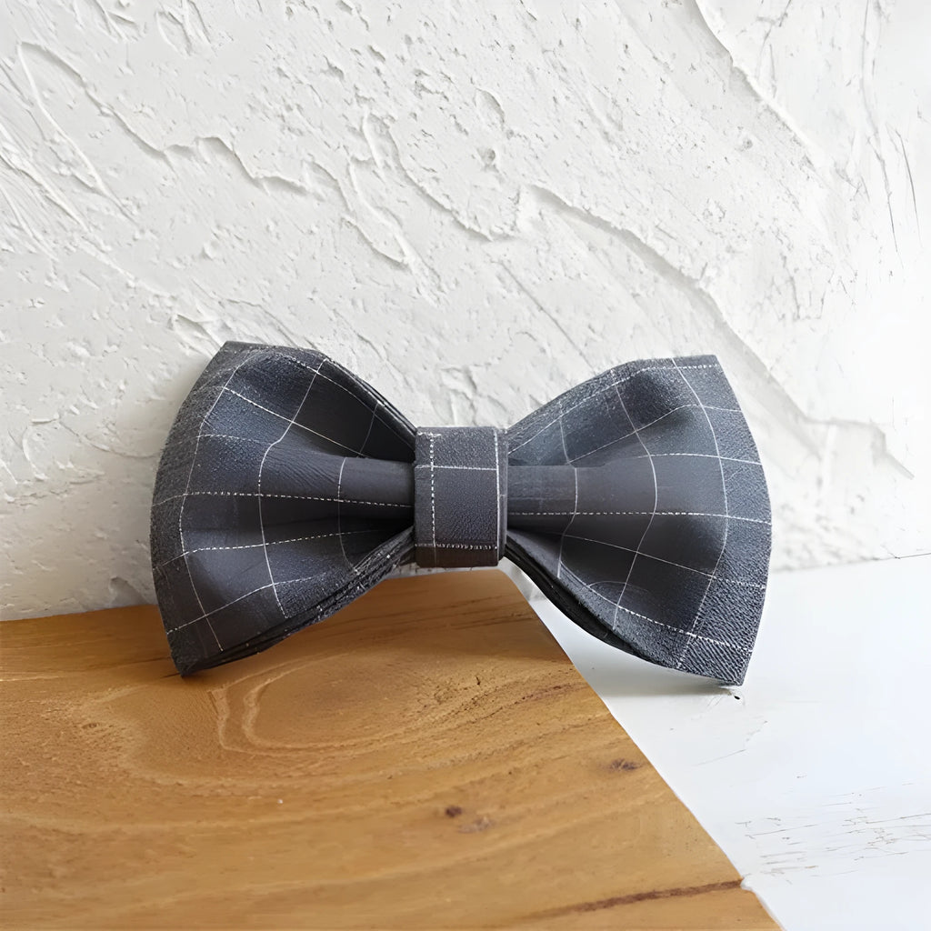 Grey polyester dog bow accessory in five sizes, 10-11cm by 6cm, for dog collars