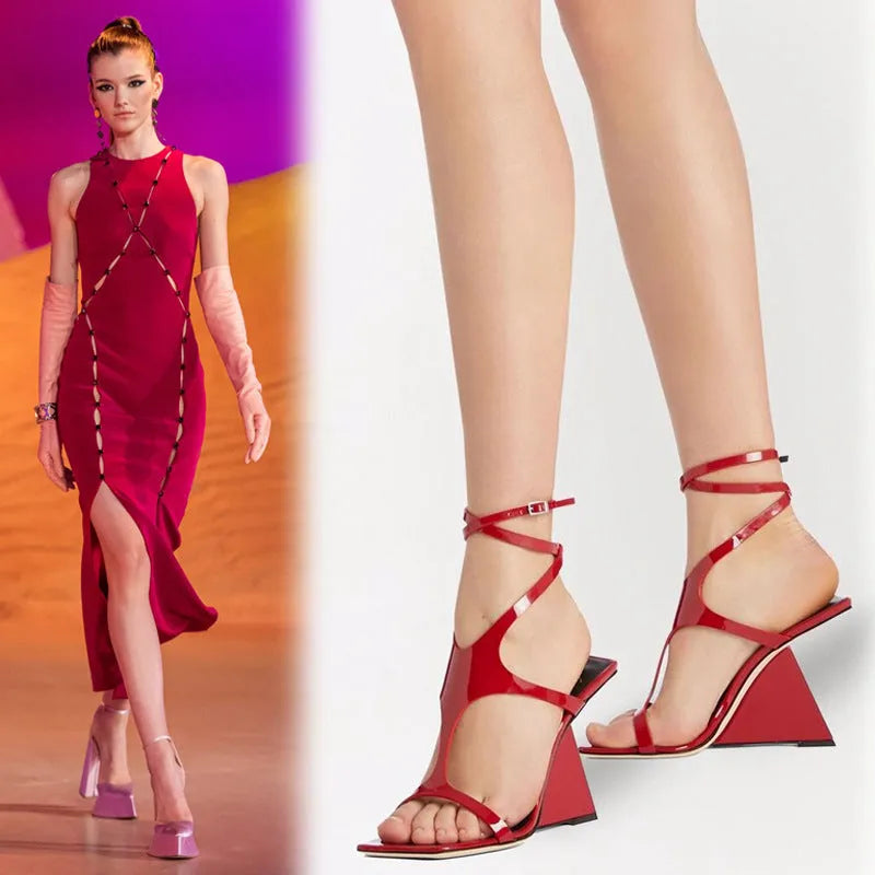 Women's black high heel sandals with square toe and button fastening on a 9.5cm heel.