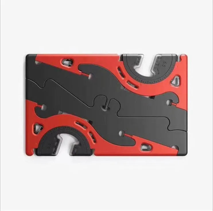 Plastic card type mobile phone holder in multiple colours on a desktop