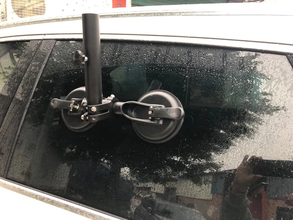 Black off-road car glass sucker mount with round rubber suction cup on ABS plastic base