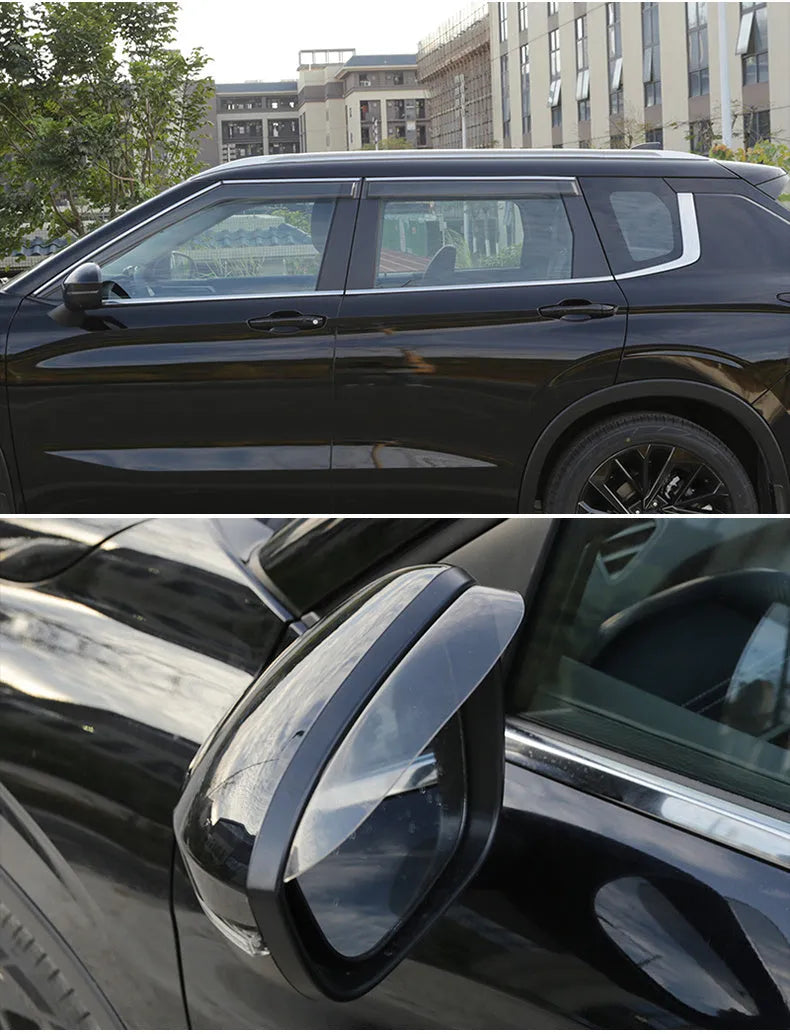 Black engineering plastic window deflectors installed on a silver 2023 Mitsubishi Outlander SUV side windows.