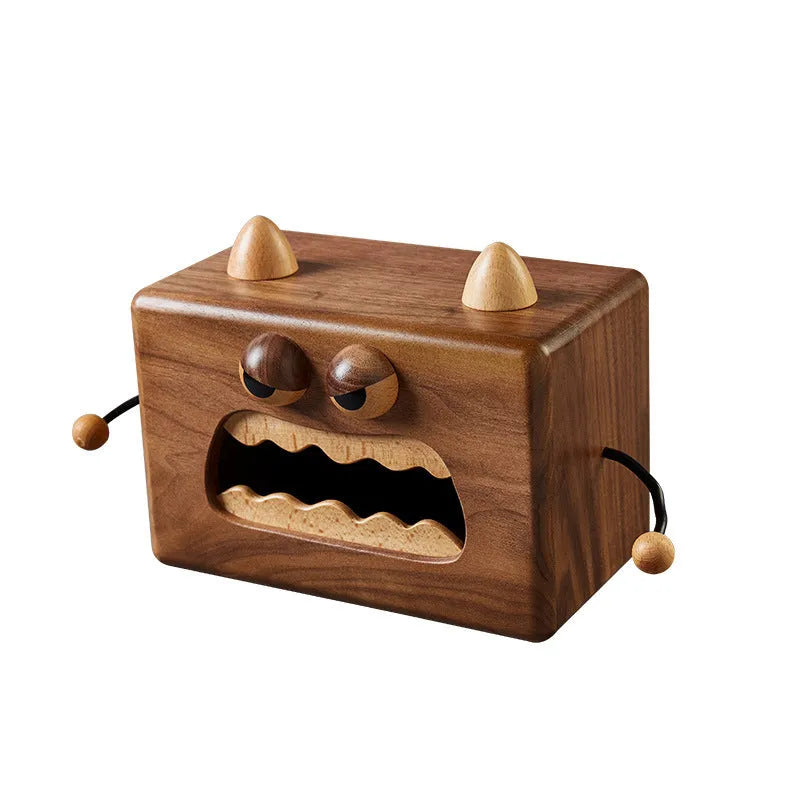 Little Monster cartoon character design on a wooden tissue box in walnut beech finish.