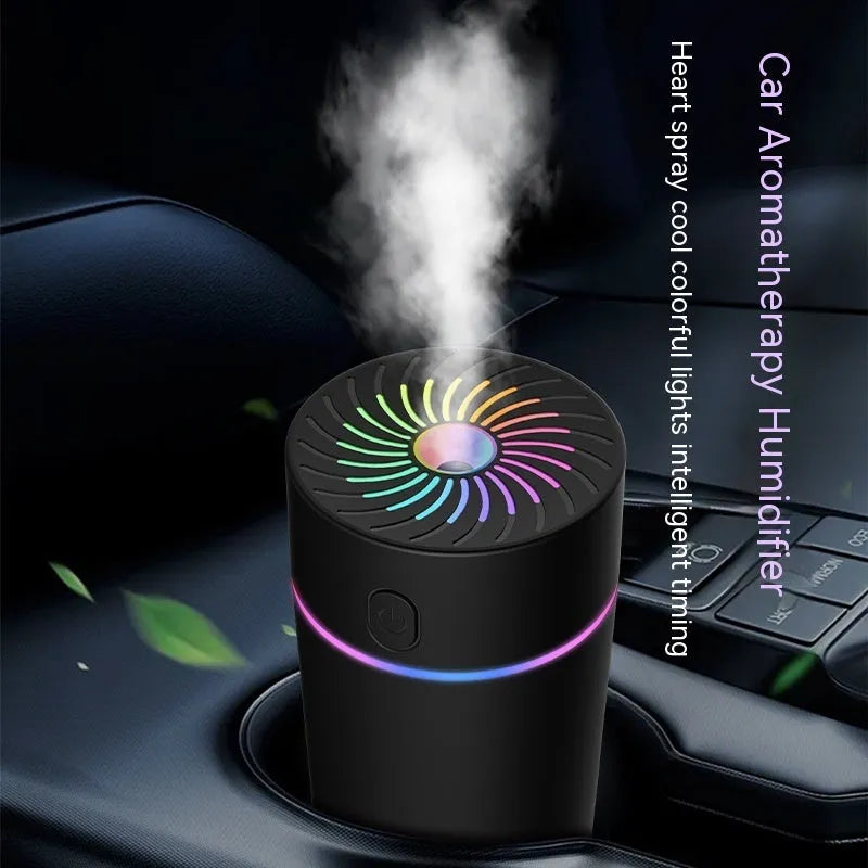 Compact USB car humidifier with aromatherapy function showing black and white colour options for vehicle use