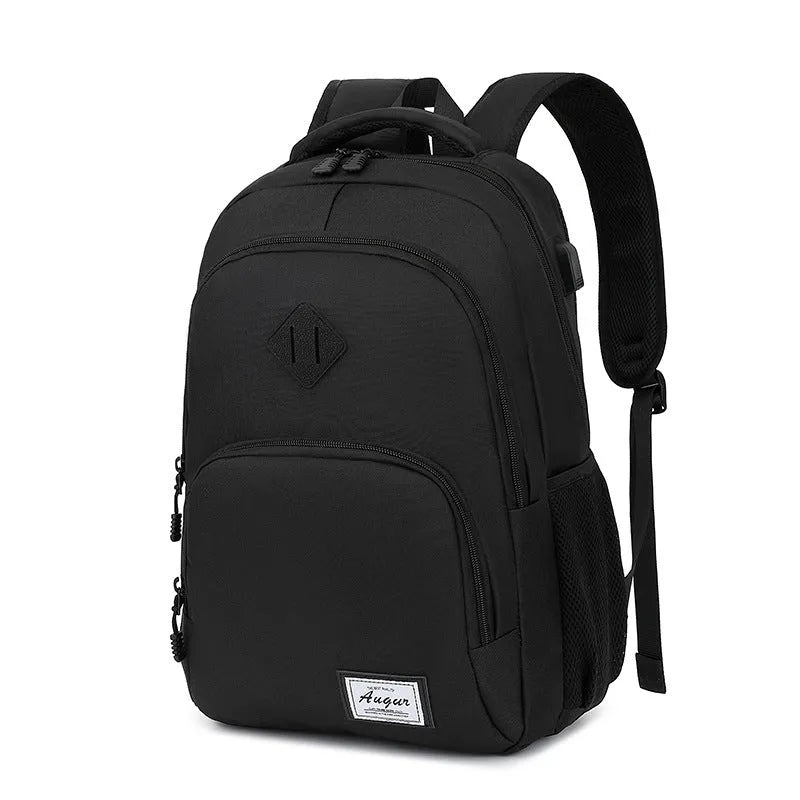 Grey lightweight nylon backpack with USB charging port shown on a trolley suitcase.