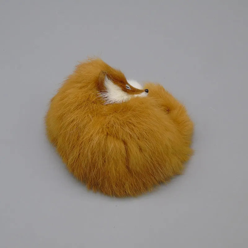 Artificial white fox fur handmade car decoration on a dashboard