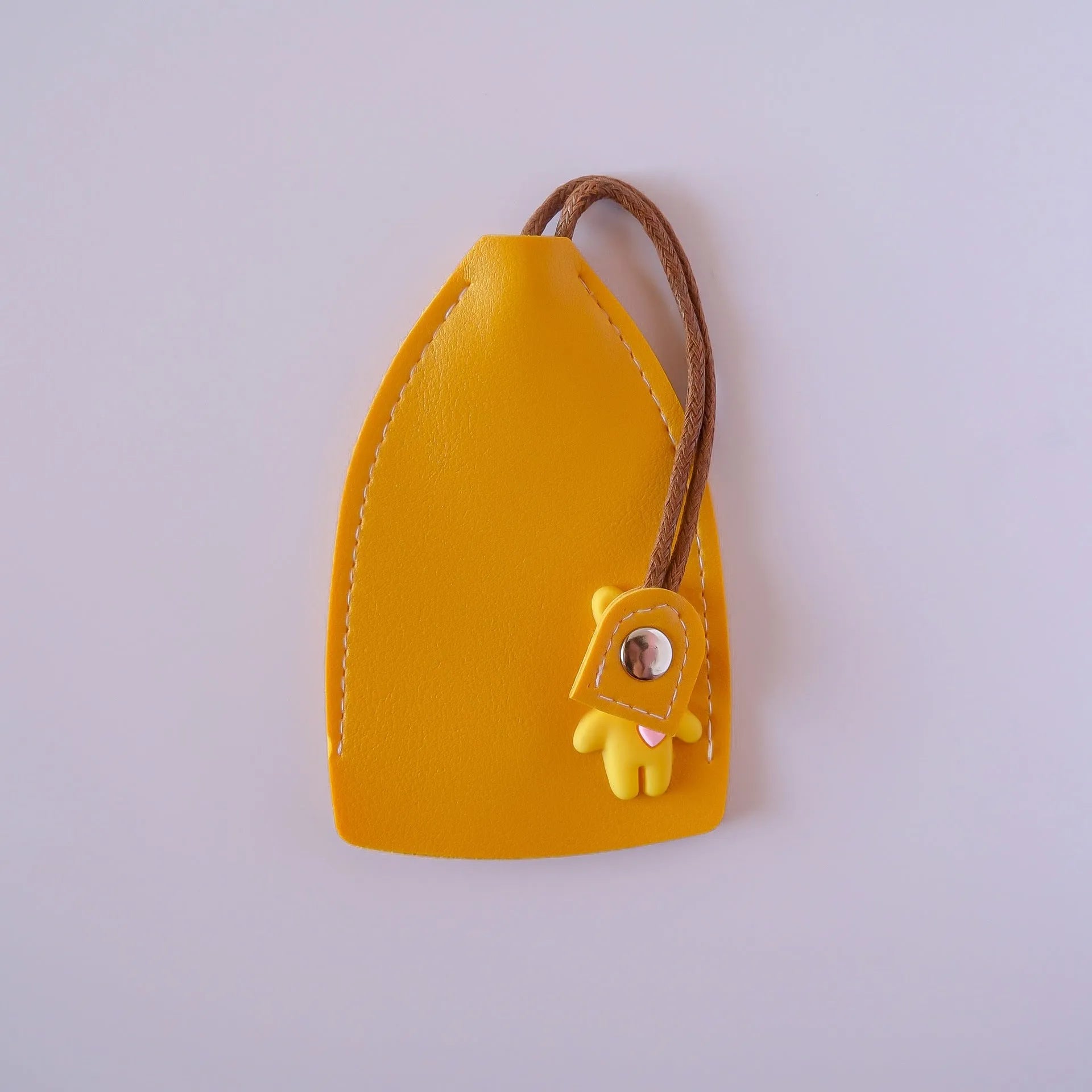 Large black PU leather car key case open to show space for multiple keys and a credit card slot.