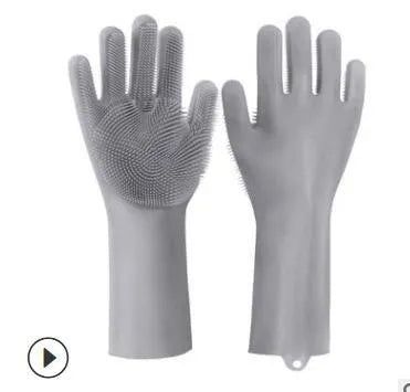 Blue silicone cleaning gloves with textured scrubbing surface on palms for washing dishes