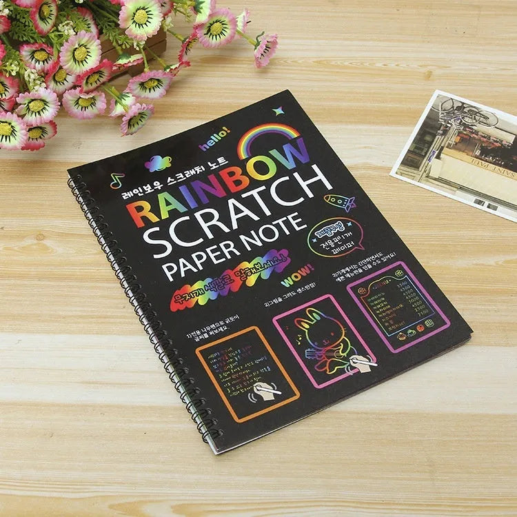 Children's large scratch art paper with scraper tool for colourful DIY painting activity.