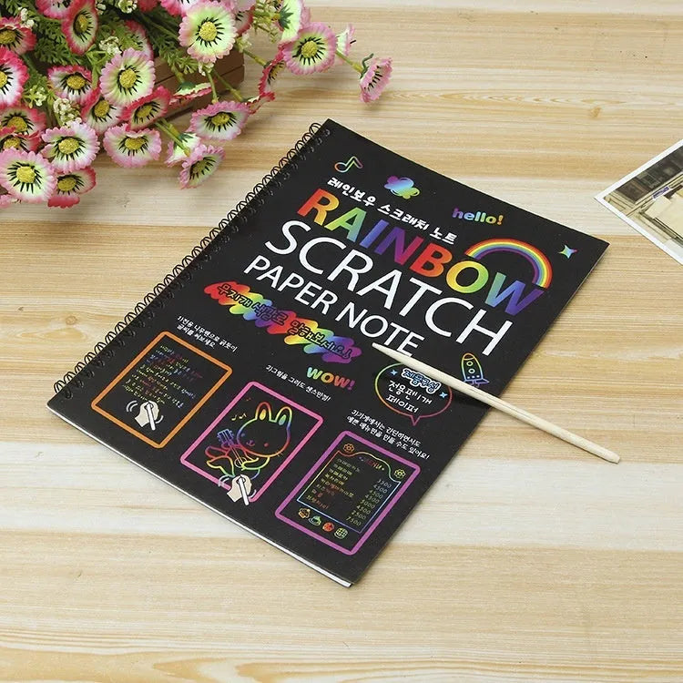 Children's large scratch art paper with scraper tool for colourful DIY painting activity.