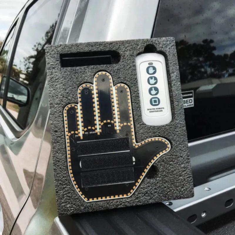 Black plastic LED illuminated gesture hand sign light for cars with remote control