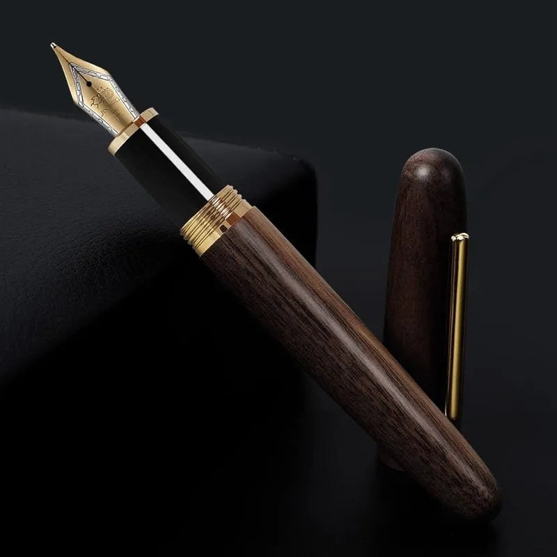 Wooden ballpoint pen with rotating cap showing alpine pear finish and straight tip