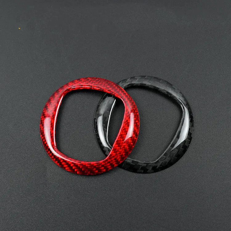 Carbon fibre steering wheel cover in black and red colour options showing textured carbon pattern