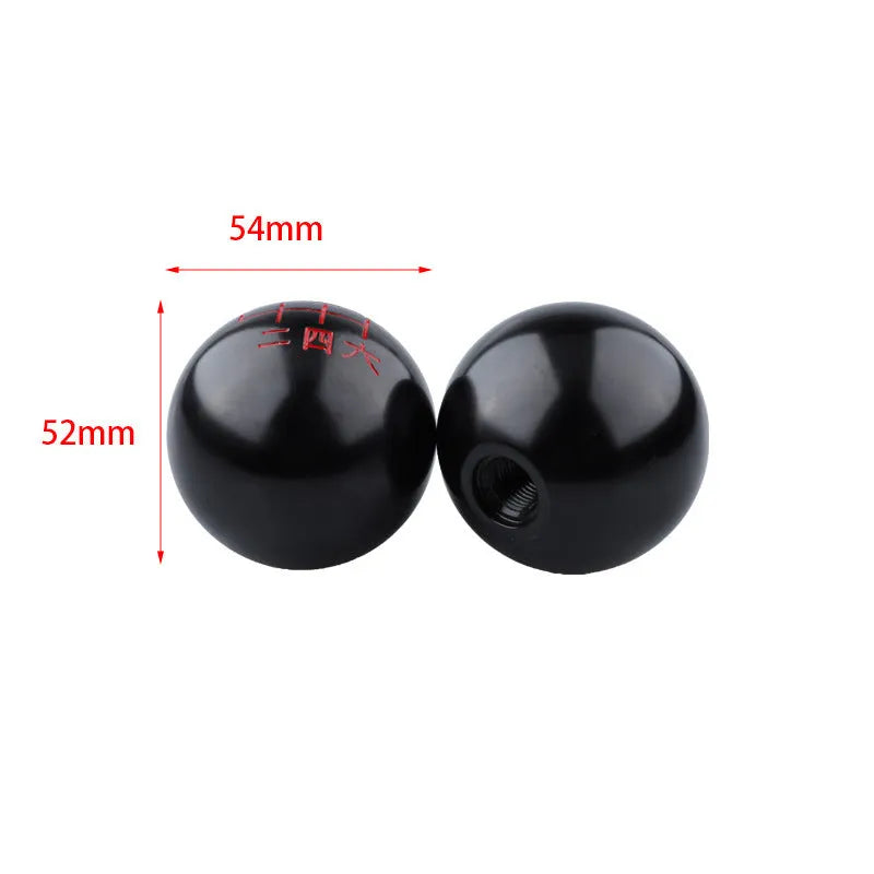 Round aluminium alloy car gear shift head shown in one of five available colour finishes.