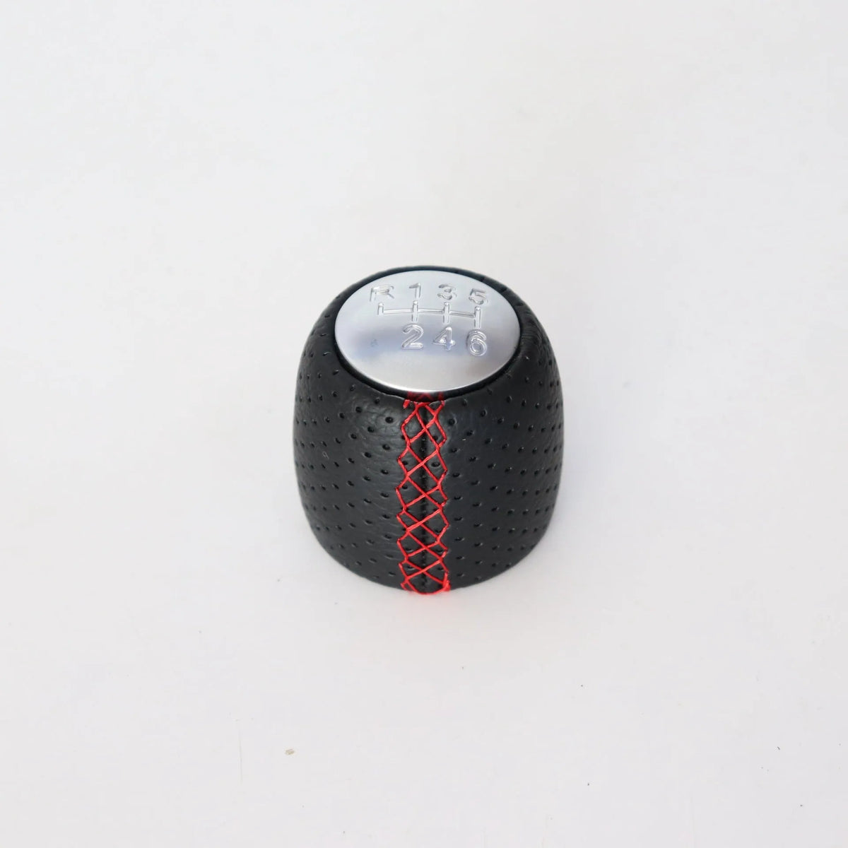 Black perforated leather-style gear shift knob for Alpha car on a 5-speed pattern matte cover.