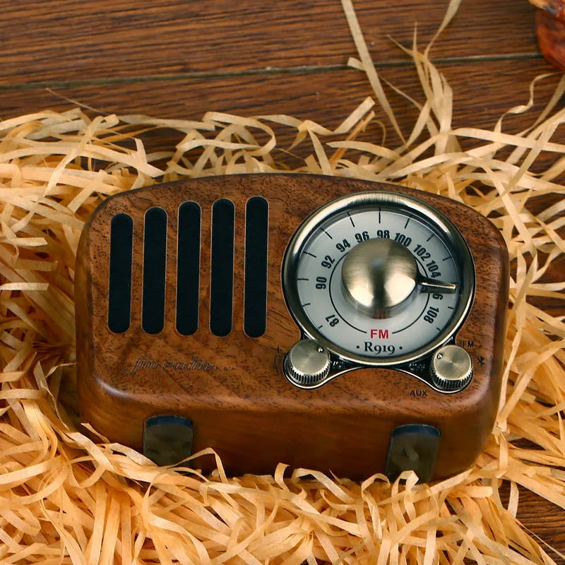 Retro wooden wireless mini Bluetooth speaker in cherry wood or walnut finish measuring 111.6mm x 50mm x 68mm