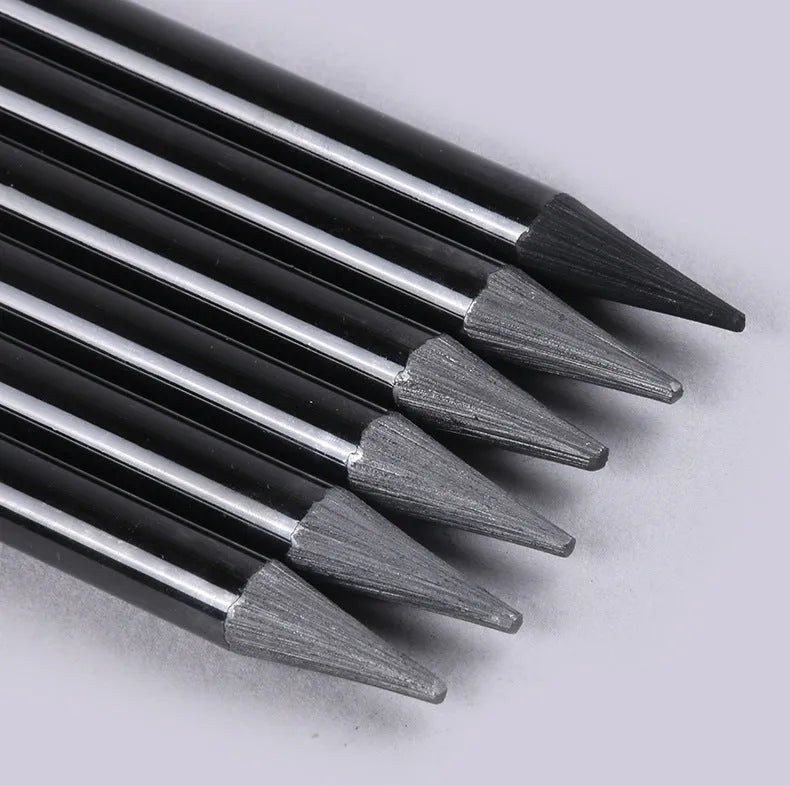 Graphite and carbonised drawing pencil set with wooden shells on suction card packaging