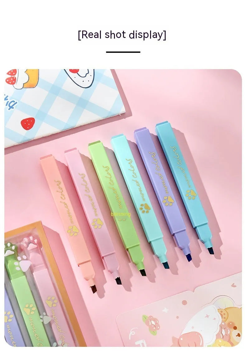 Cat's Paw set of six fluorescent marker pens with oblique nibs in a plastic storage case.