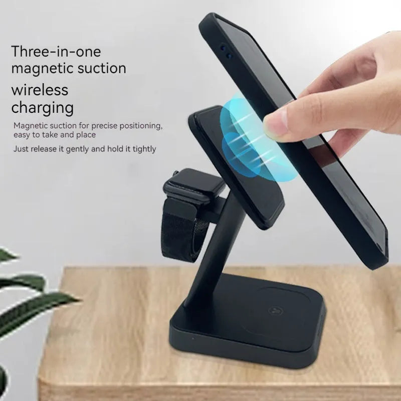 Black cube-shaped 3-in-1 vertical wireless charging stand and portable power bank on a desk.