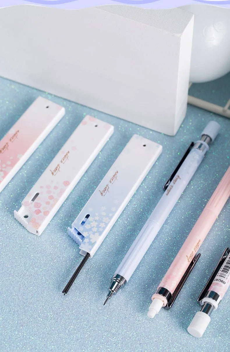 Simplified 0.5mm cartoon automatic pencil set with three pencils and HB refill boxes