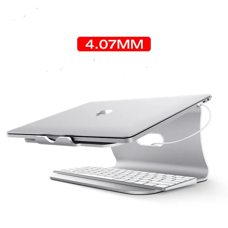 Aluminium alloy laptop cooling bracket in grey colour with rotary hinge adjustment on a desk.
