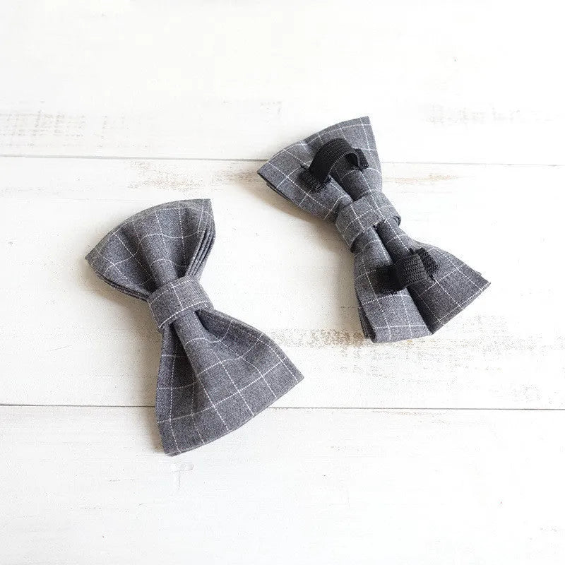 Grey polyester dog bow accessory in five sizes, 10-11cm by 6cm, for dog collars