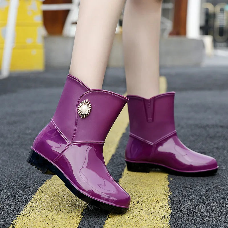 Women's low tube PVC rain boot in beige colour with non-slip sole.
