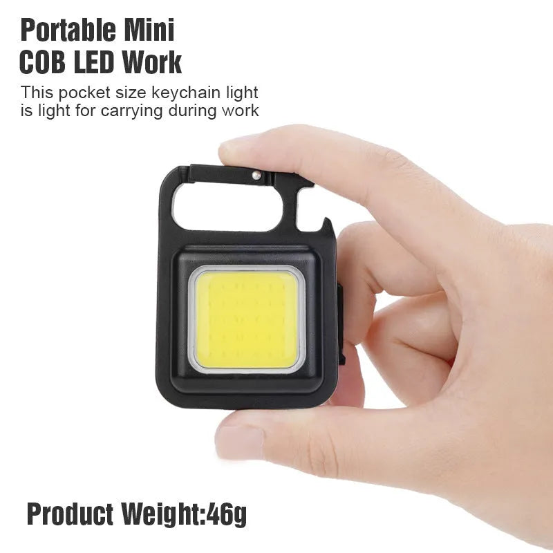 Black aluminium alloy USB rechargeable keychain flashlight with magnetic base and folded swivel handle