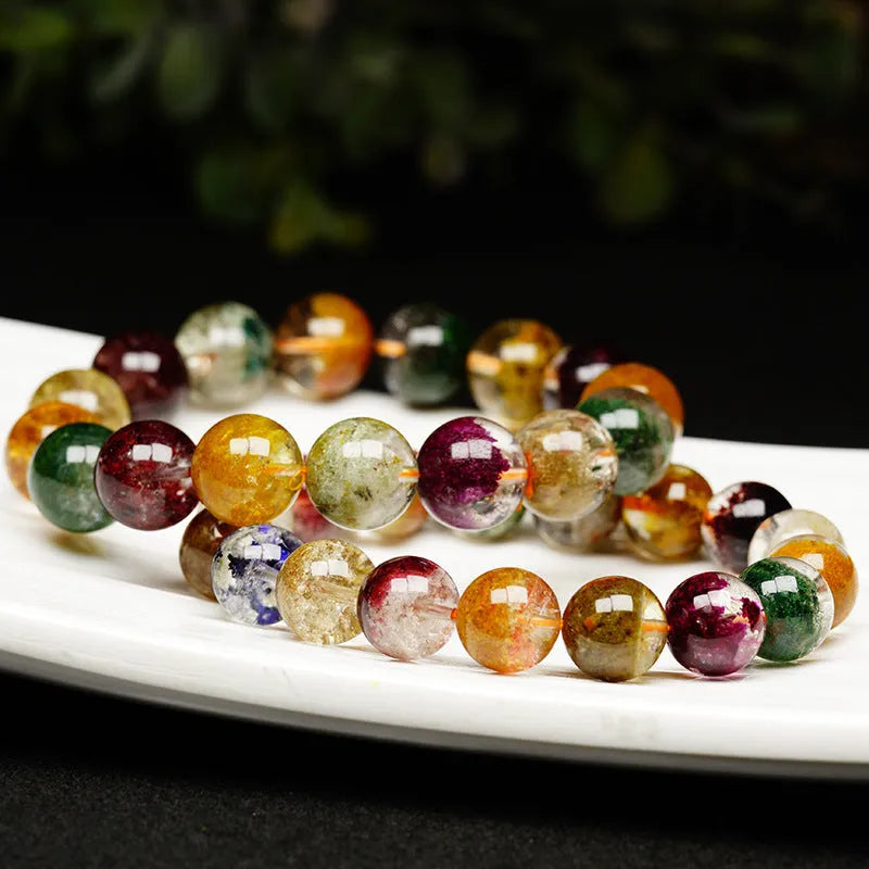 Crystal ethnic style bracelet with 10mm beads showing natural four seasons colourful ghost cornucopia design