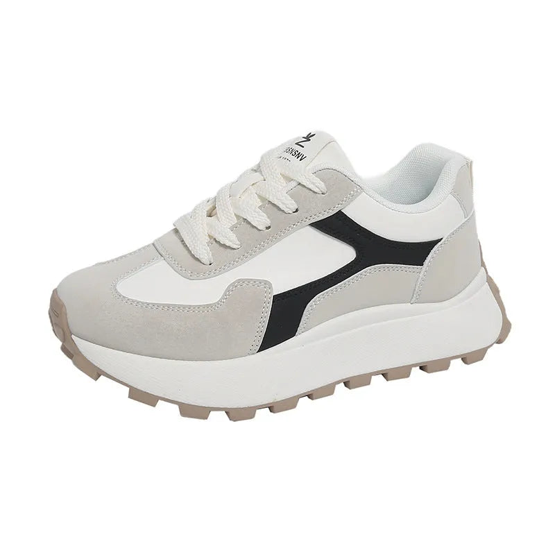 Women's casual platform sport shoes in solid colours with flat rubber sole and lace-up front.