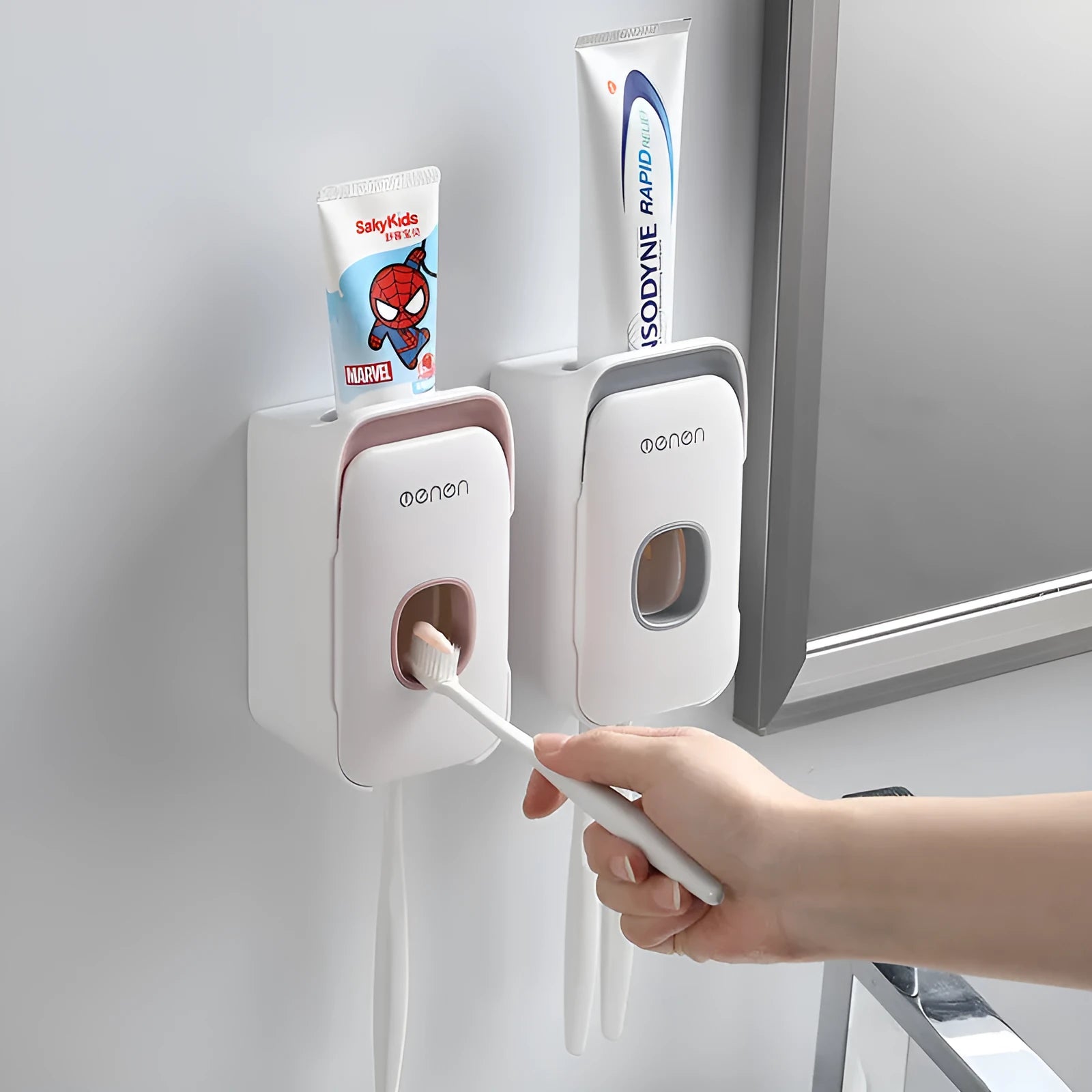 Automatic wall-mounted toothpaste dispenser in blue, grey, or pink colours with LED display