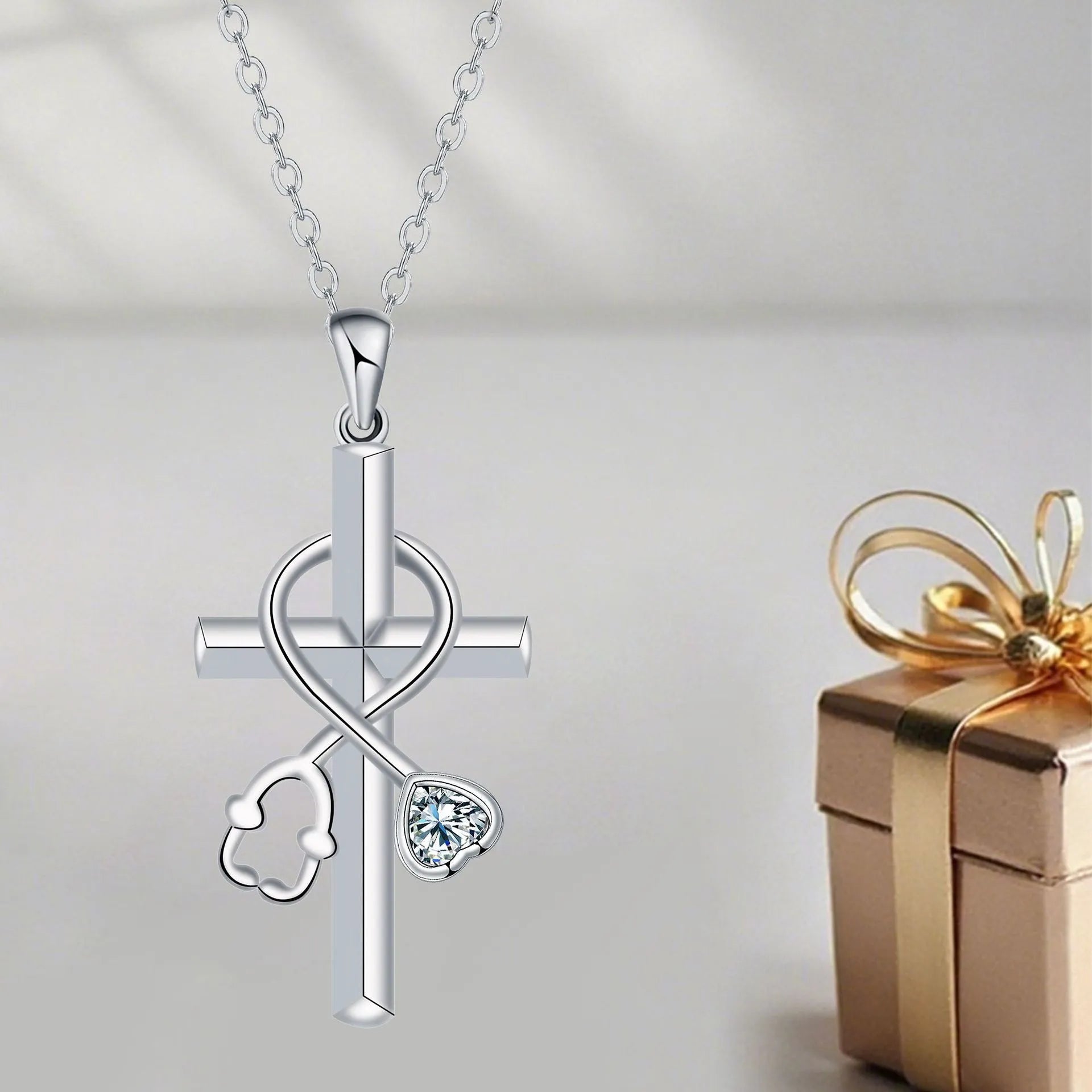 Women's stethoscope necklace with cross pendant made from electroplated copper on cross chain