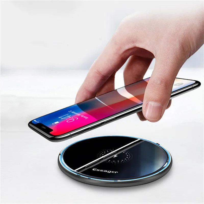 Black 15W fast wireless charging pad with anti-slip surface and LED light, measuring 10.1cm by 7cm