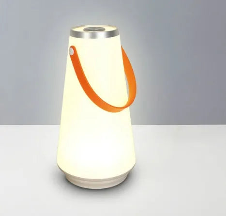 White rechargeable bedside table lamp with USB charging cable and touch control for adjustable brightness