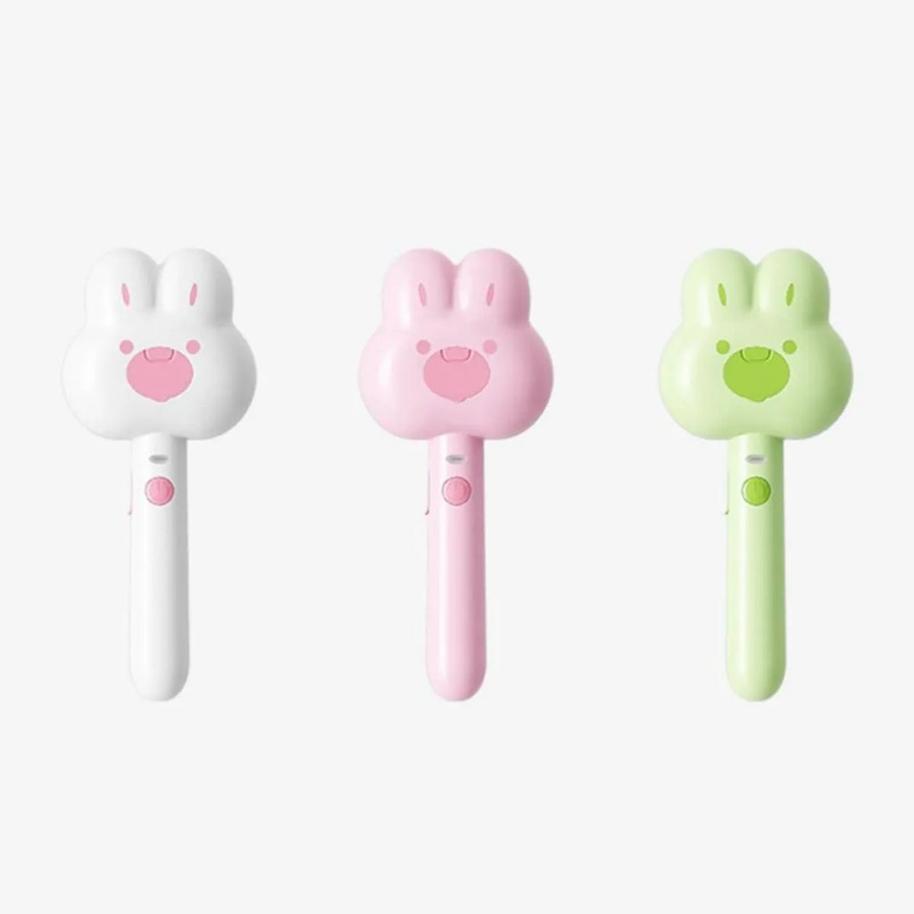 Rechargeable pet steam grooming brush in cartoon design with green, pink or white colour options