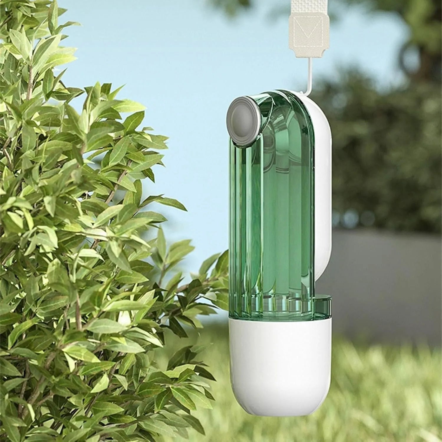 Beige foldable dog water bottle with food container at base, shown extended and collapsed.