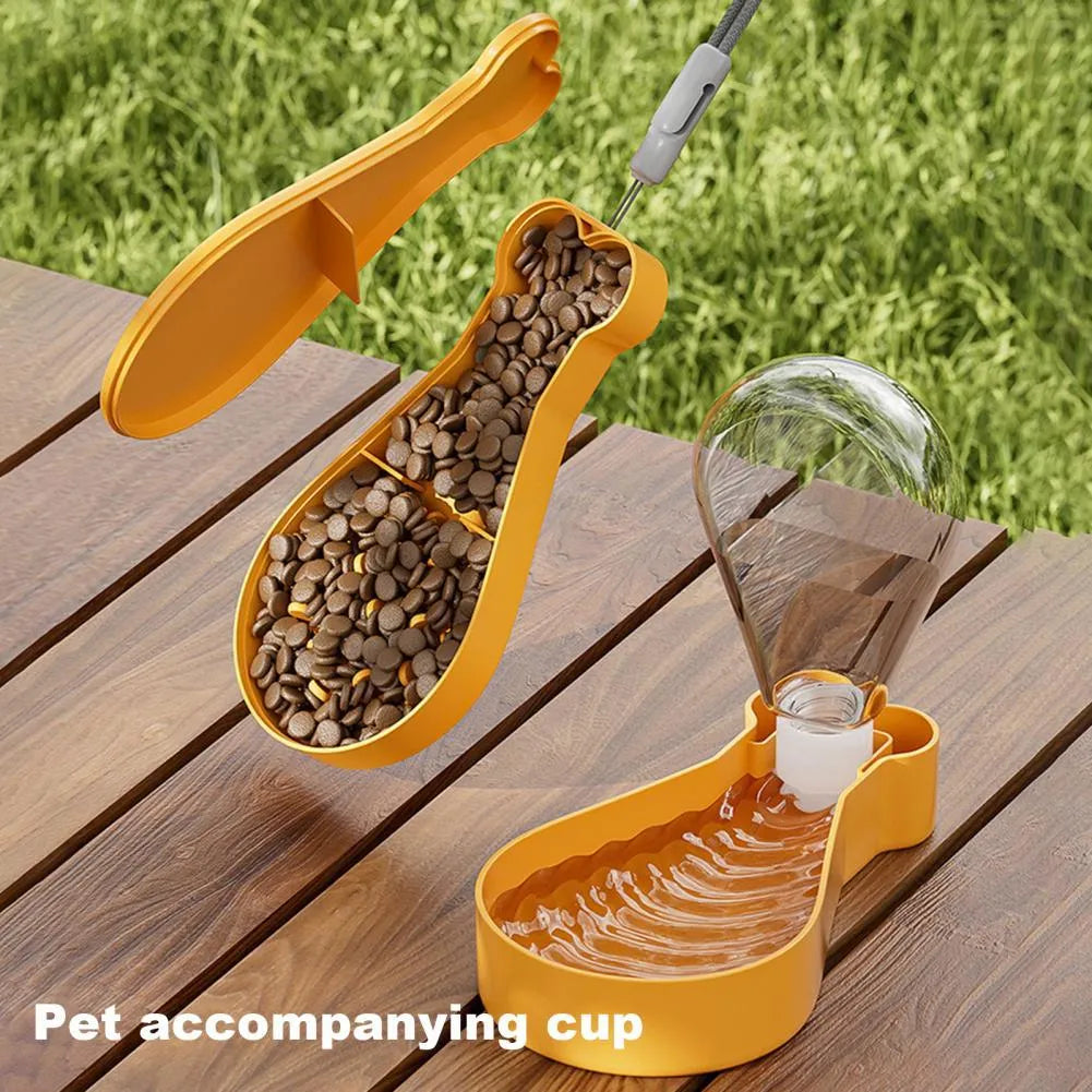Orange and white portable pet water feeder bottle with food container compartment