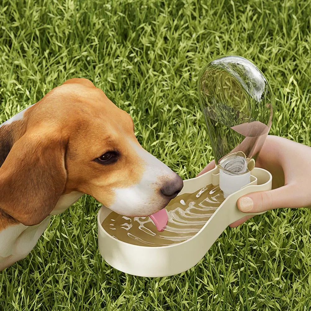 Orange and white portable pet water feeder bottle with food container compartment
