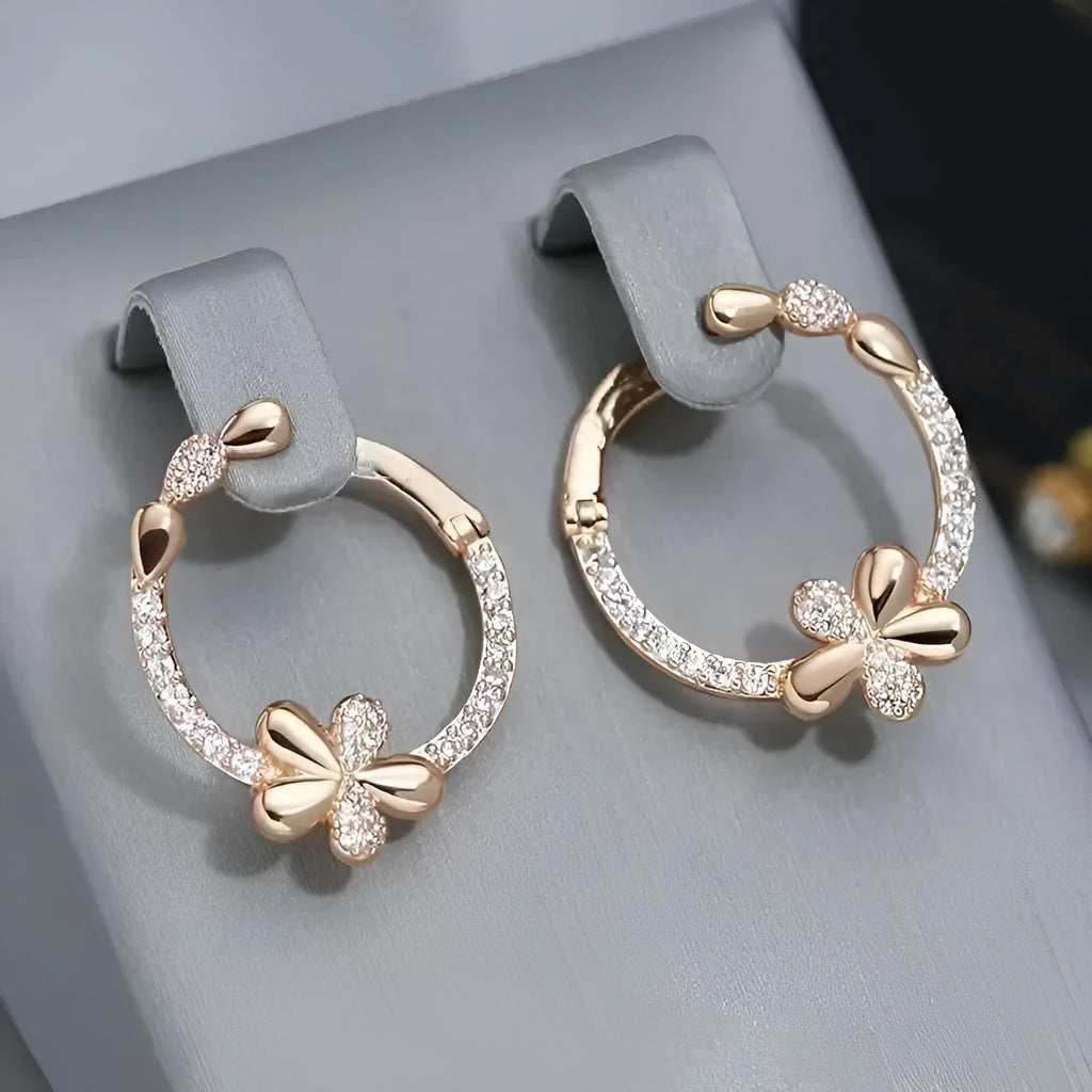 A pair of women's round silver hoop earrings made from electroplated copper.
