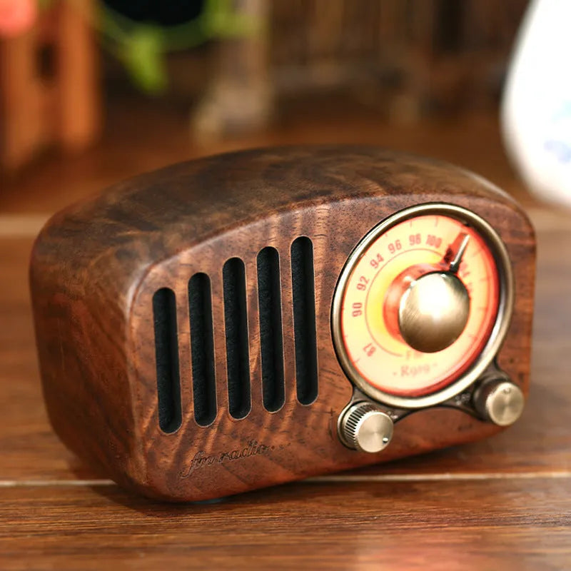 Retro wooden wireless mini Bluetooth speaker in cherry wood or walnut finish measuring 111.6mm x 50mm x 68mm