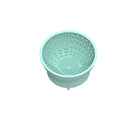 Cyan silicone dog bowl with licking mat texture and suction cup base on a hard floor