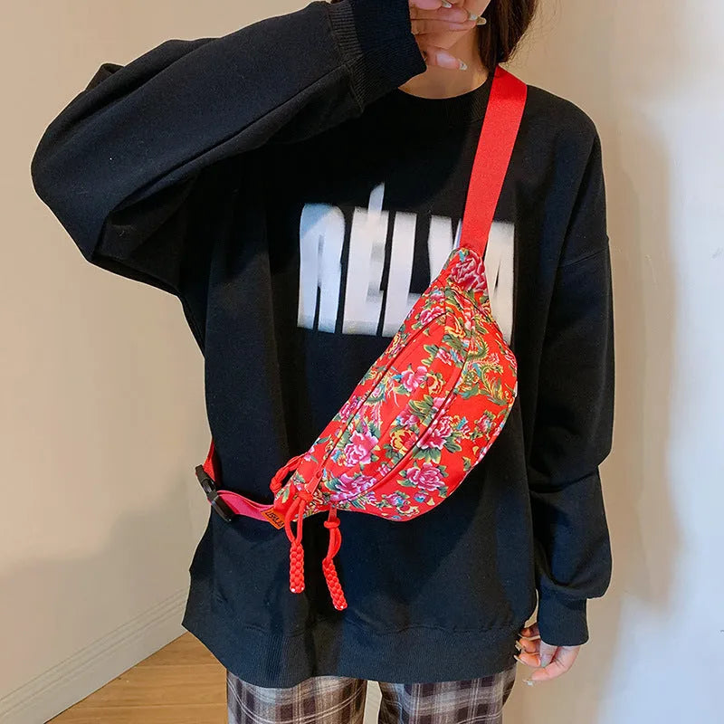 Women's western style waist bag with large floral decoration and contrast stitching
