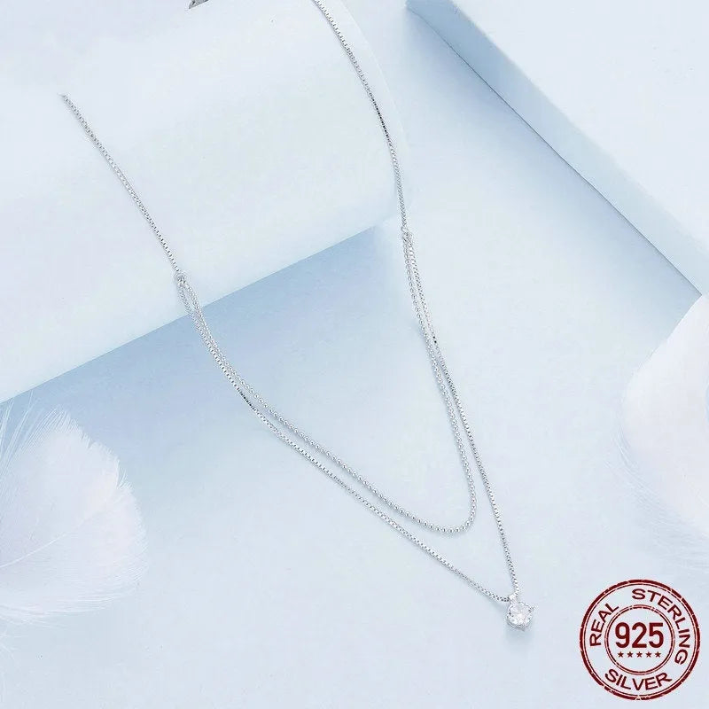 Women's double-layer sterling silver necklace with pearl chain design in silver colour