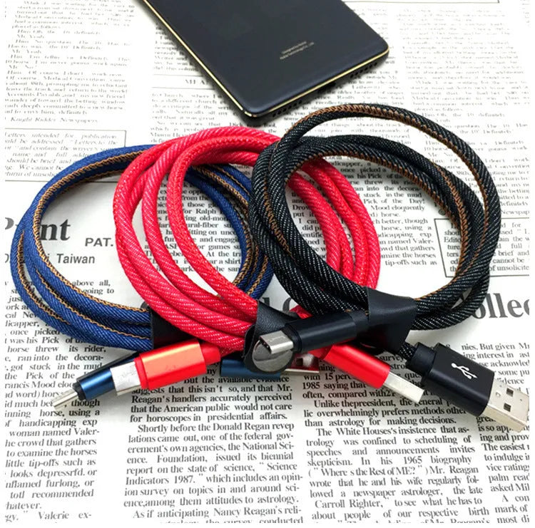 Close-up of a denim-braided USB-C cable with aluminium connectors in choice of colours.