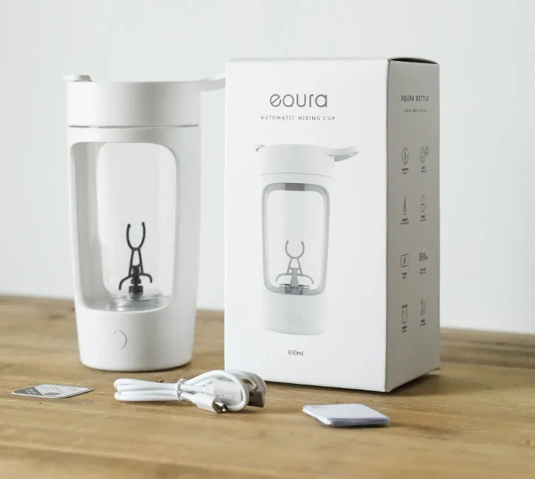 Portable automatic blending cup in chosen colour, showing measuring lid and compact size.