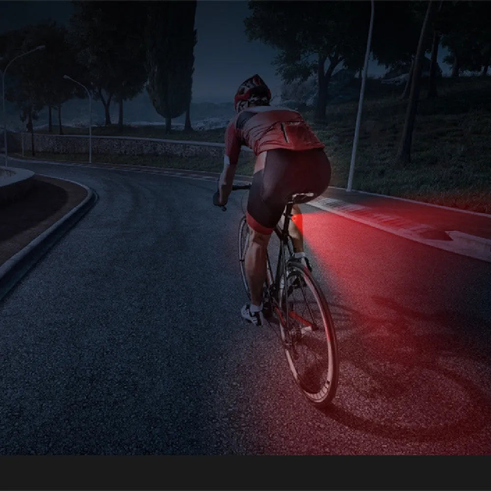 Black aluminium alloy smart brake sensing USB charging taillight for bicycles.