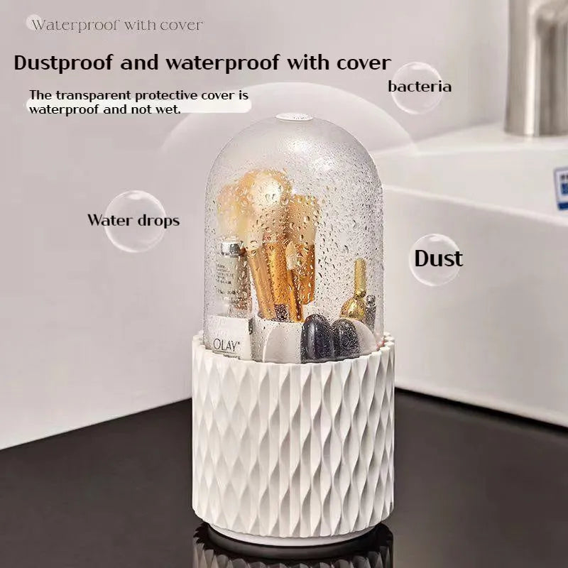 White transparent acrylic makeup brush holder with lid on a desktop, showing rotating base.