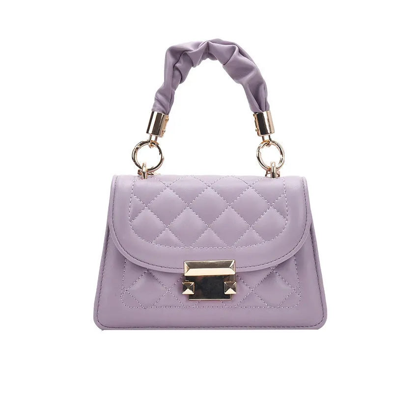 Small purple rhombus-shaped square shoulder bag with a long crossbody strap
