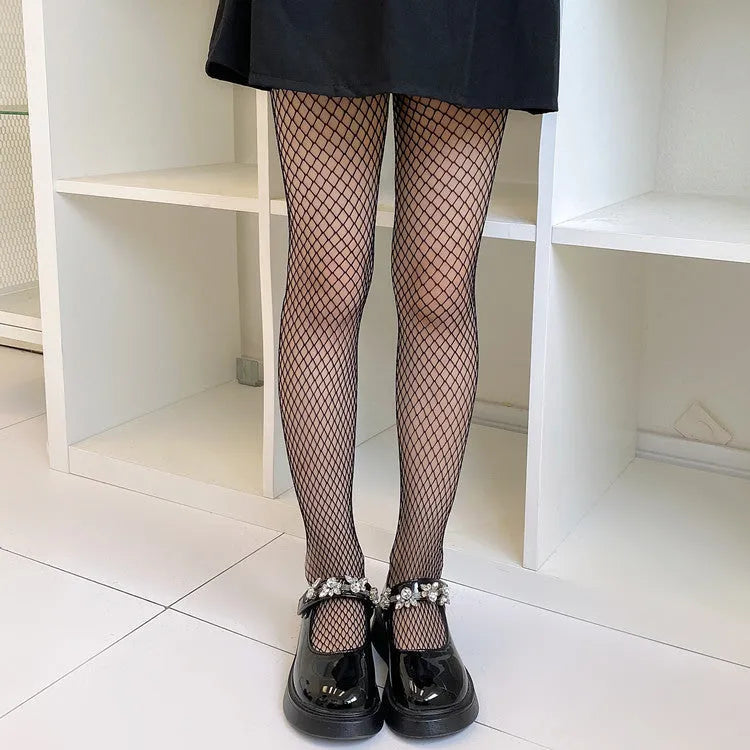 Women's thin mesh stockings in large, medium, and small net patterns in black and white.